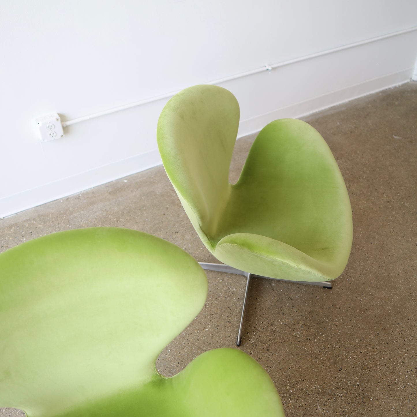Early Arne Jacobsen “Swan” Chairs, a pair