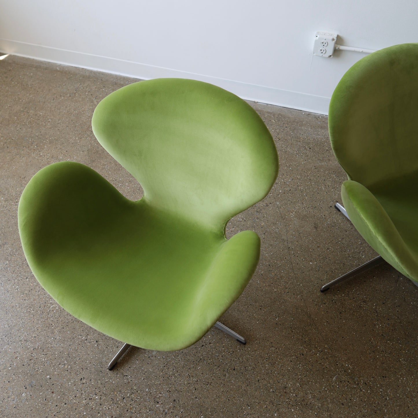 Early Arne Jacobsen “Swan” Chairs, a pair