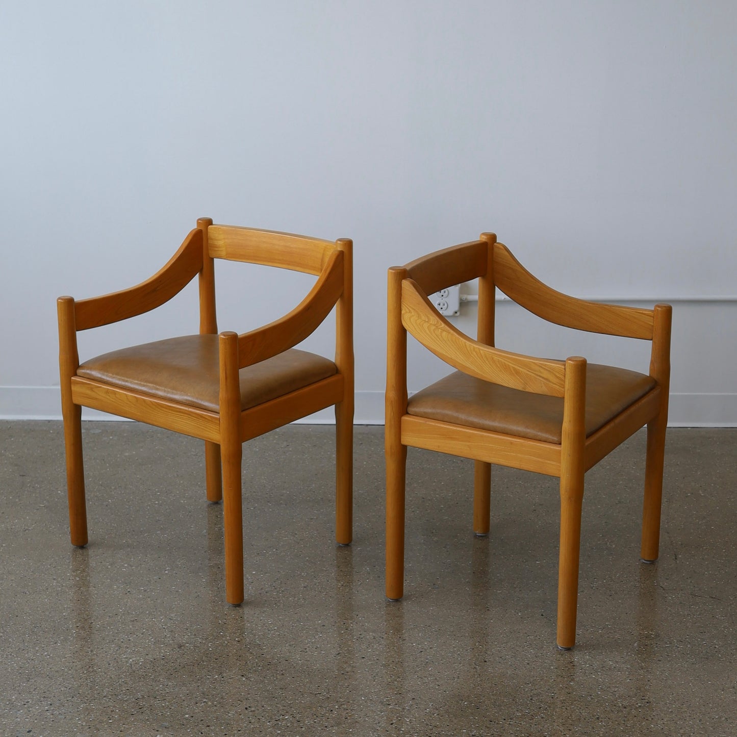 Vico Magistretti “Carimate” Dining Chairs, a pair