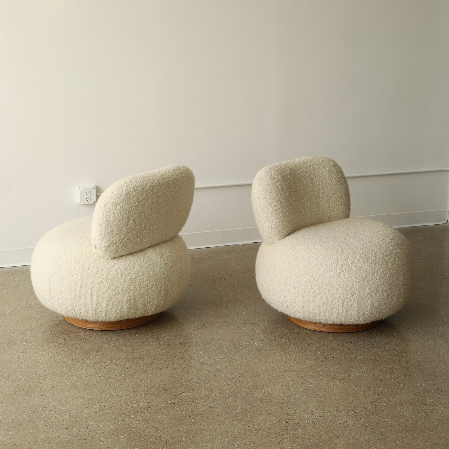 Steve Chase Swivel Poufs, a pair