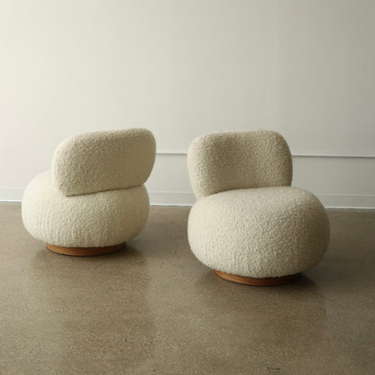 Steve Chase Swivel Poufs, a pair