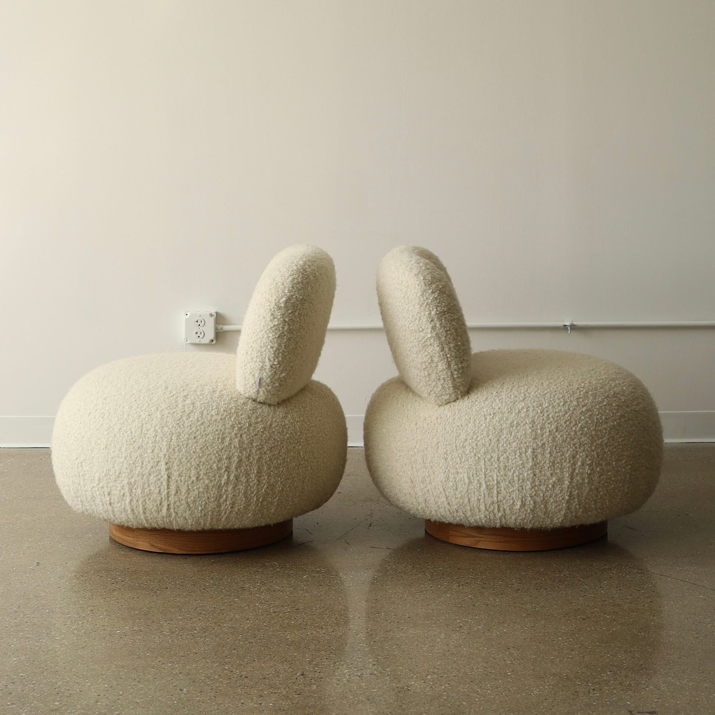 Steve Chase Swivel Poufs, a pair