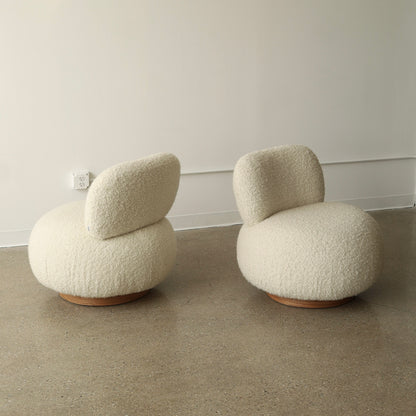 Steve Chase Swivel Poufs, a pair