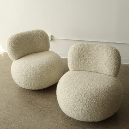 Steve Chase Swivel Poufs, a pair