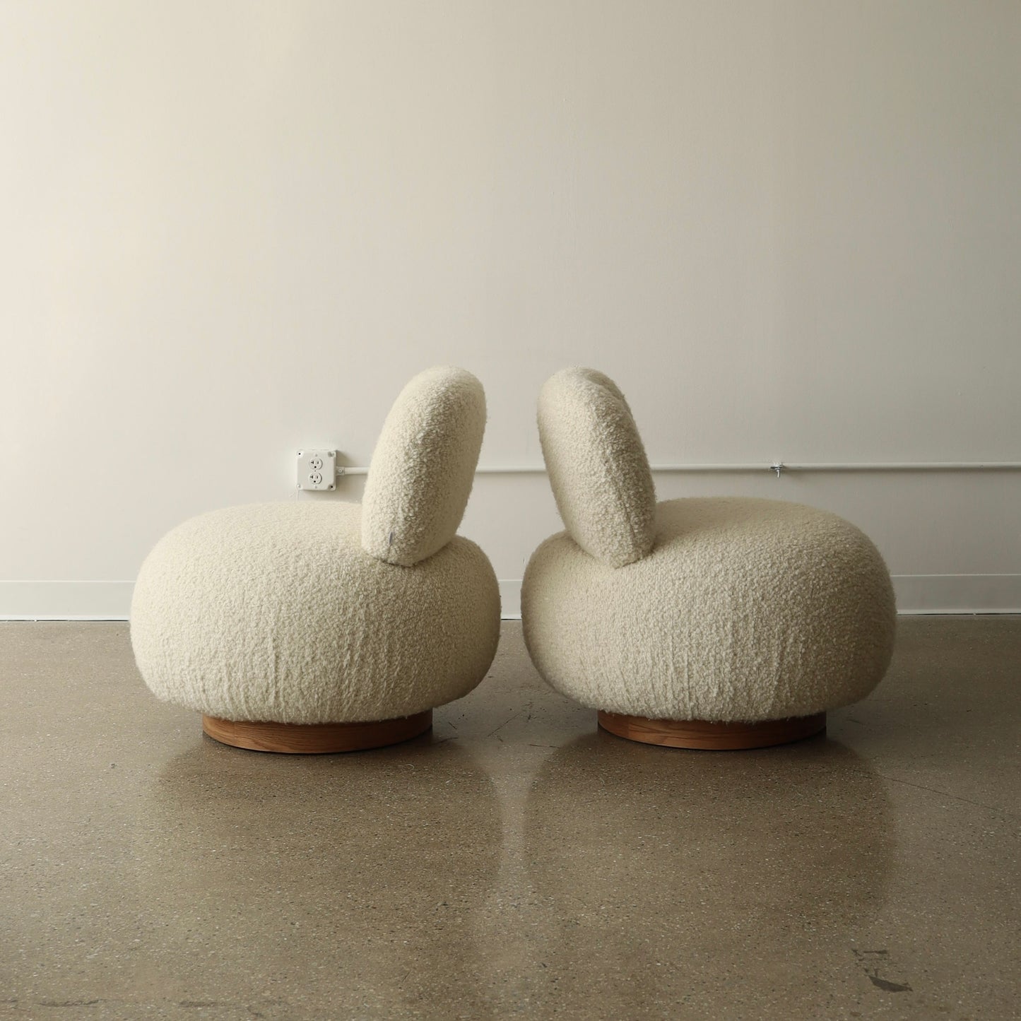 Steve Chase Swivel Poufs, a pair